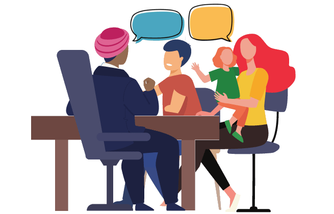 Two adults and two children sat at a table talking to each other. This is represented by two speech bubbles.
